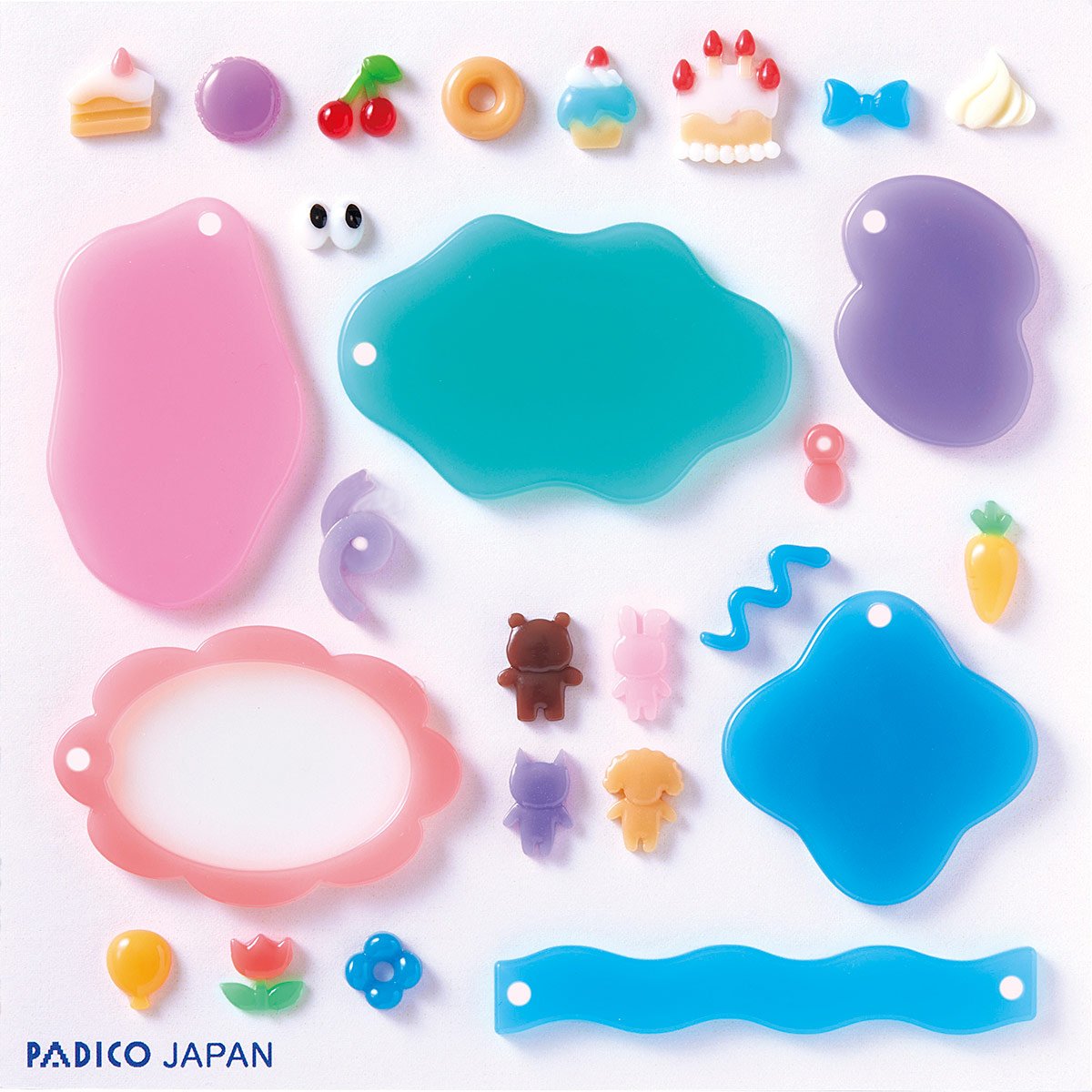 Muotti, joustava ja l�pin�kyv�, "PUHEKUPLA #1 KUVIOITA" Kokelma jossa 6 isompaa muotoa ja 20 pient� osaa niiden koristeluun. Tee esim avainperi� ja asustekoristeita (UV-led hartsille, massoille)